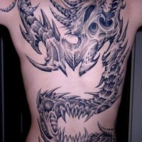 Biomechanical dragon tattoo on whole back