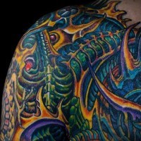 Amazing coloured biomechanical tattoo