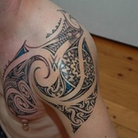 Biomech style tribal tattoo