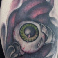 Biomech eyeball coloured tattoo