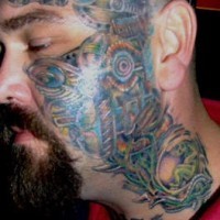 Biomech face tattoo