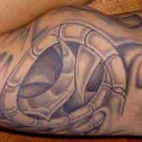 Surreal spiral tattoo