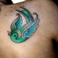 Gemusterter blauer Vogel Tattoo
