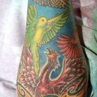 Colourful tattoo with many birds