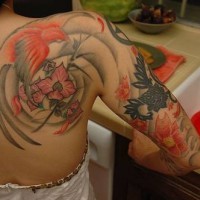 Amazing bird themed artwork tattoo