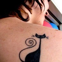 Stylish black cat tattoo on shoulder