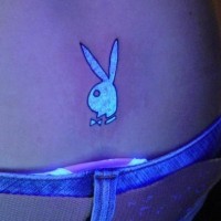 Playboy bunny uv ink tattoo
