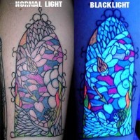 Colouful mosaic glowing tattoo