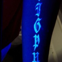 Glowing text uv ink tattoo
