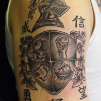 Heraldic shield black ink tattoo