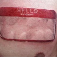 Tattoo mit leerem Namensschild