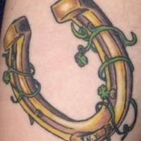 Golden horseshoe tattoo