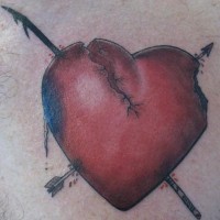 Realistic broken heart tattoo