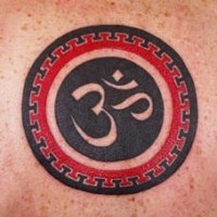 Buddhist symbol red and black ink tattoo