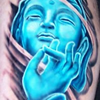 Blue praying buddha tattoo