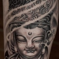 Le tatouage de statue de Bouddha originaire