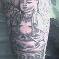 Peaceful bald buddha black ink tattoo