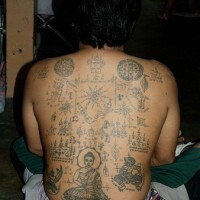 Native tibetian full back tattoo on back