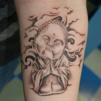 Smiling buddha in clouds black ink tattoo