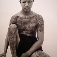 Tibetian buddhist with full body mantra tattoo