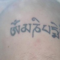 Buddhist hindu writings tattoo