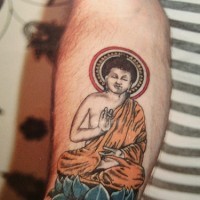 Buddha meditating coloured tattoo