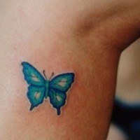 Almost invisible blue butterfly tattoo