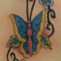 Humanized butterfly with flower tracery tattoo