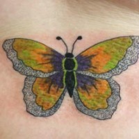Yellow and silver butterfly tattoo