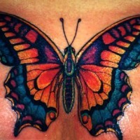 Tattoo eines gelben und blauen Schmetterlings