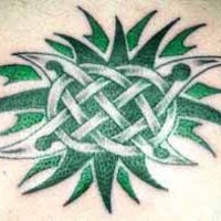 Green celtic tracery tattoo