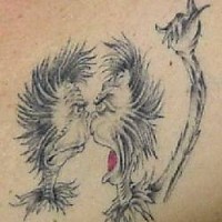 Deux Grinches arguant tatouage