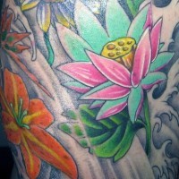 Bunch of flowers with lily tattoo