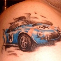 Old race car coloured tattoo