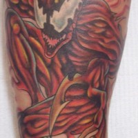 Tall, red ,impudent spiderman in carnage forearm tattoo
