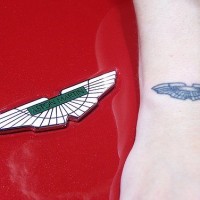 Aston martin logo tattoo