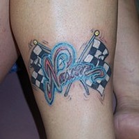 Nascar racing tattoo with flags