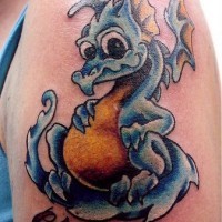 Little blue dragon tattoo on shoulder