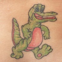 Cartoonish green alligator tattoo