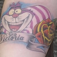 Cheshire cat with rose coloured tattoo