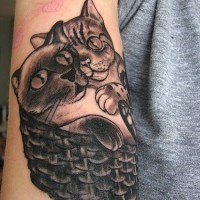 Two cats in basket black ink tattoo