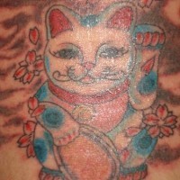 Red and blue maneki-neko  tattoo