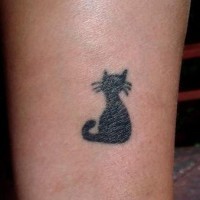 Minimalistic black cat silhouette tattoo