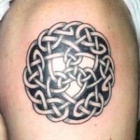 Celtic knot with trinity symbol inside tattoo