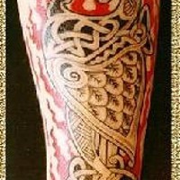 Celtic magic bird in flames tattoo