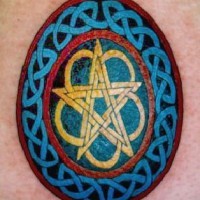 Pentagram in celtic circle coloured tattoo