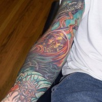 Colourful buddha themed sleeve tattoo