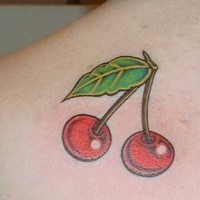 Realistic red cherry tattoo