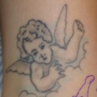 Conture cherub in clouds tattoo