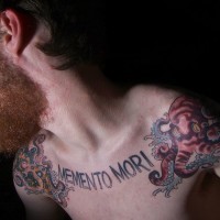 Memento mori chest tattoo